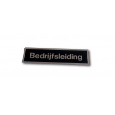 STICKER 165X45 ZWART/ZILVER TEKST "BEDRIJFSLEIDING"